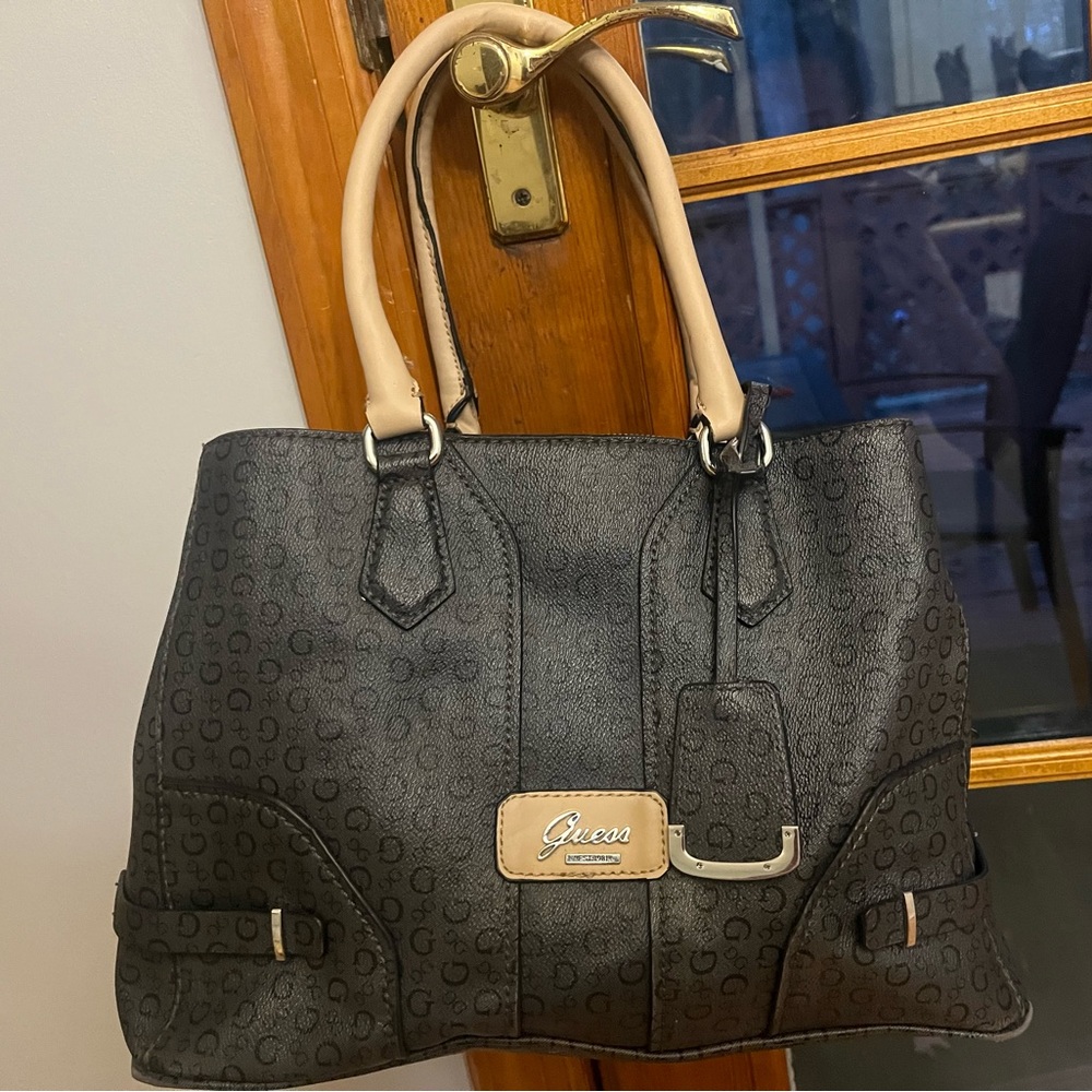 Guess purse dark brown with leopard inside